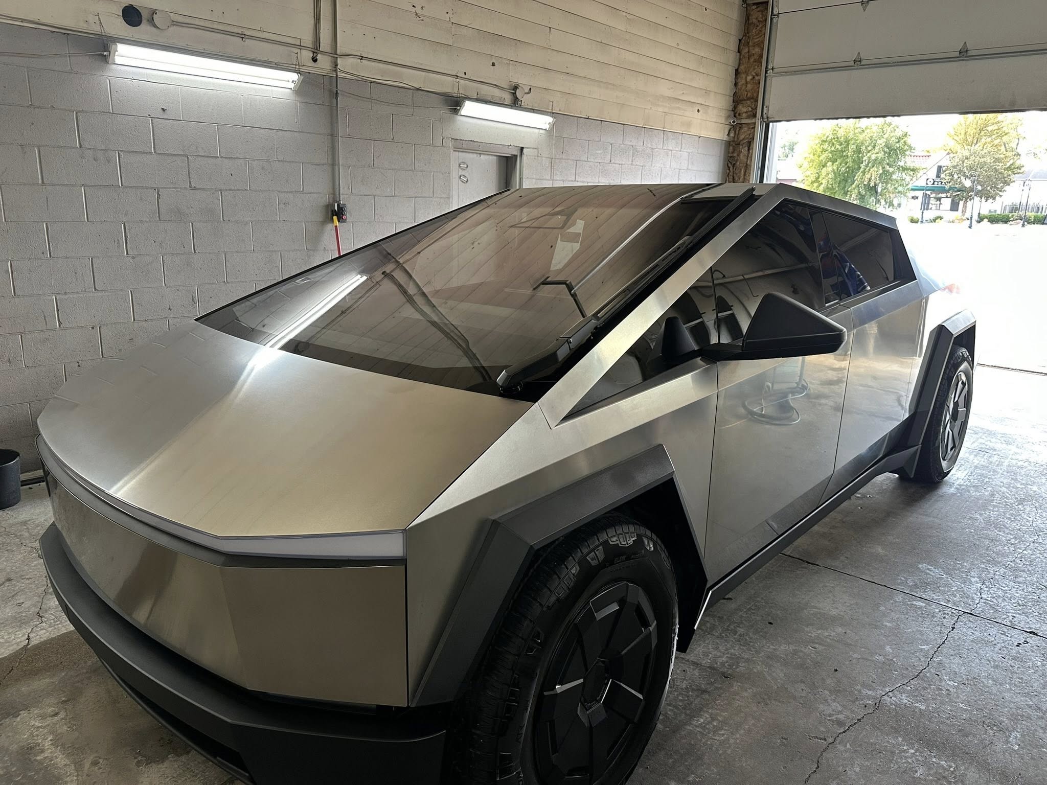 Tesla Cybertruck in auto detailing bay at Bugeaters Detail and Wash in Omaha Nebraska